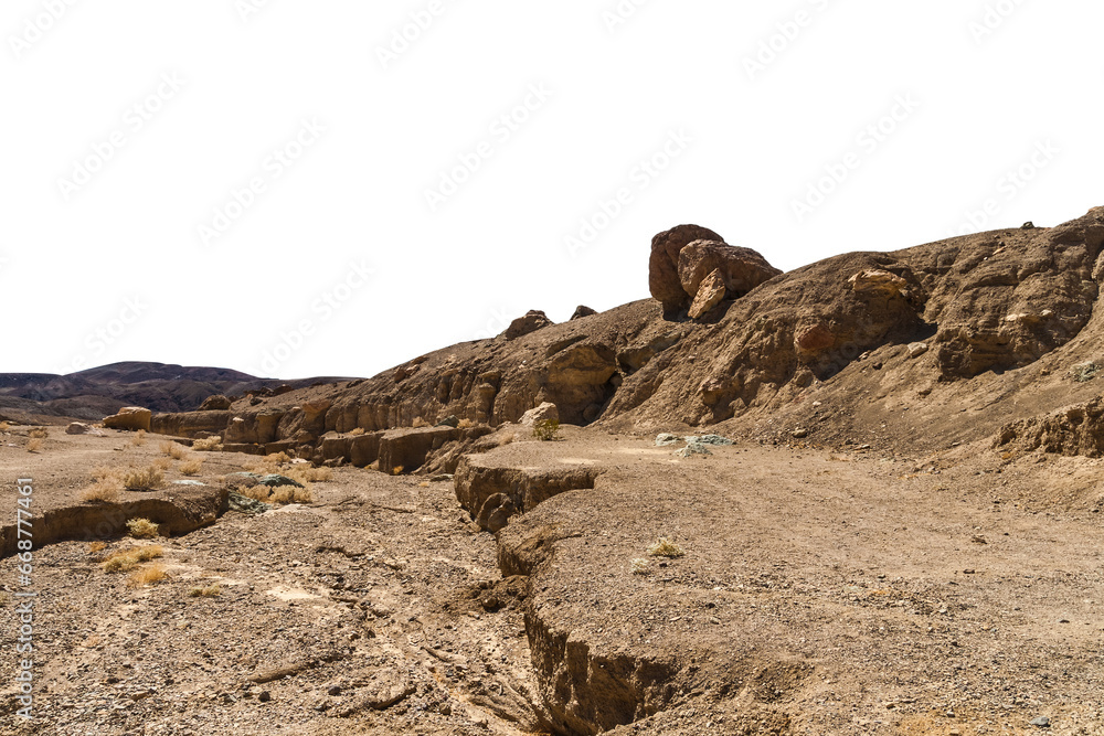 Scenic desert, arid and rocky landscape isolated on white background or cut out. Scenic desert, arid and rocky landscape isolated on white background or cut out.