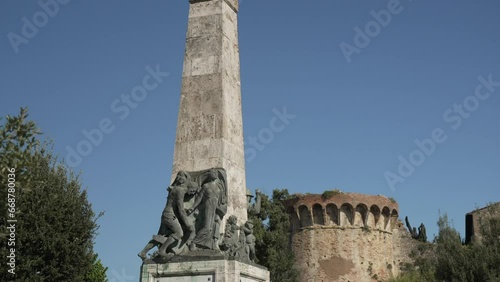 View of First World War Memorial in Piazzale Montemaggio in San Gimignano, San Gimignano, Province of Siena, Tuscany, Italy photo