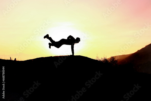 Pose of sporty man doing endurance test to encourage people to do sports
