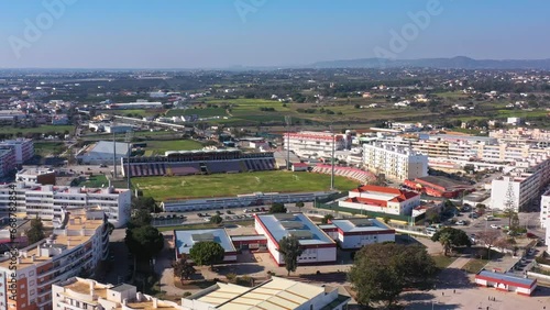 Aerial drone footage of the Portuguese southern town of Olhao. View of the Jose Arcanjo stadium. photo