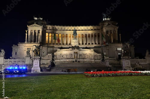 Altar of the Fatherland in Rome at night with police light