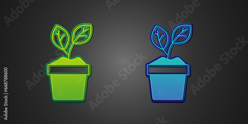 Green and blue Plant in pot icon isolated on black background. Plant growing in a pot. Potted plant sign. Vector