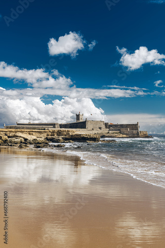 The São Julião Lighthouse, located in the fort of the same name, and situated on a headland on the north bank of the River Tagus estuary in Oeiras, Lisbon District, Portugal.