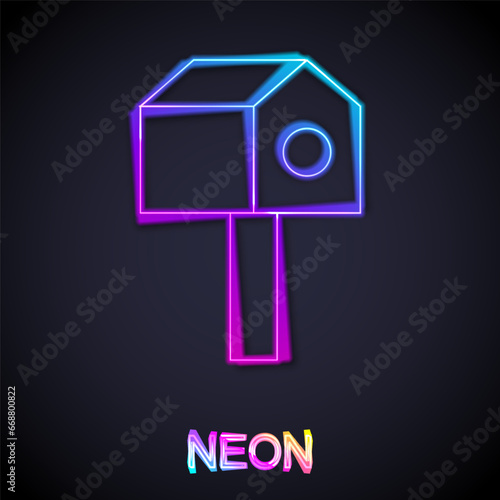 Glowing neon line Bird house icon isolated on black background. Nesting box birdhouse, homemade building for birds. Vector