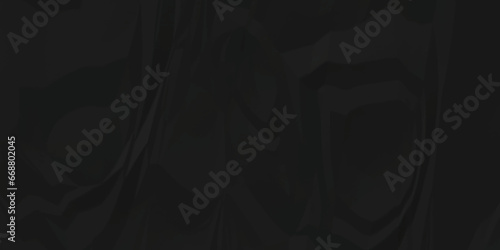 Dark black crumpled paper texture. black wrinkled paper texture. Black paper texture. Black crumpled and top view textures can be used for background of text or any contents.