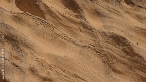 closeup of sand pattern of a beach