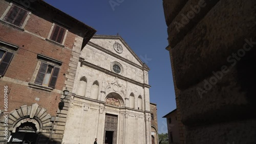View of St. Agostino Church in narrow street in Montepulciano, Montepulciano, Province of Siena, Tuscany, Italy photo