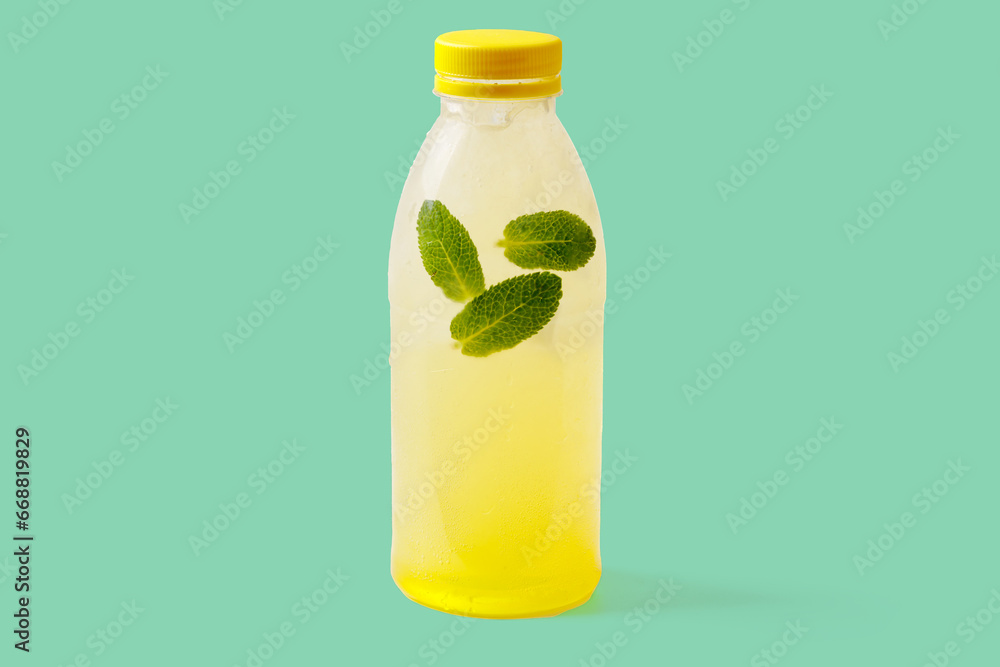 Melon lemonade with melon puree, mint, melon syrup, ice, sparkling water on a green background for food delivery website 2 Melon lemonade with melon puree, mint, melon syrup, ice, sparkling water on a green background for food delivery website 2