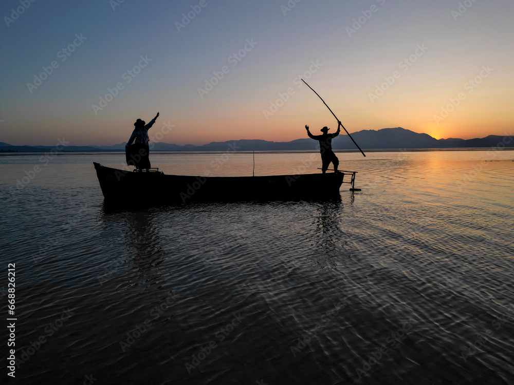 The harmonious, motivational and energetic movements of fishermen couples and their time going to work