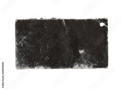 worn black label with frayed edges on transparent png background  photo