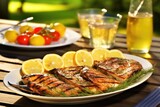 platter of barbecued oysters with lemon wedges