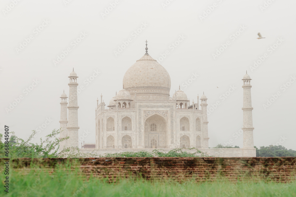 couple  with the view of Taj Mahal in Agra, India