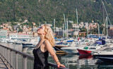 Elegant woman on vacation - Lake Como views, concept of travel in Italy. Nature landscape. Ideas for journey.