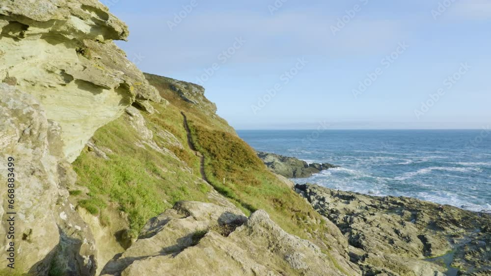 English Coastal Path Passing Along Stunning Rocky Coastline In Evening Sun English Coastal Path Passing Along Stunning Rocky Coastline In Evening Sun
