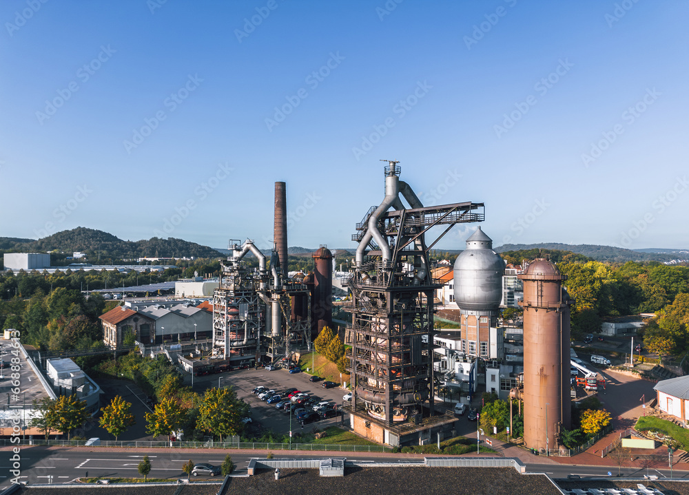 Autumn cityscape of Neunkirchen, Saarland, Germany. Aerial view of Altes Hüttenareal - Neunkirchen Ironworks (German: Neunkircher Eisenwerk)