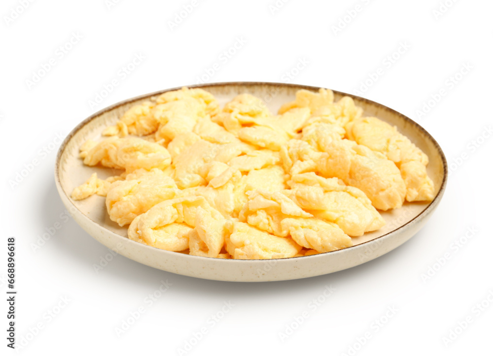Plate of delicious scrambled eggs isolated on white background