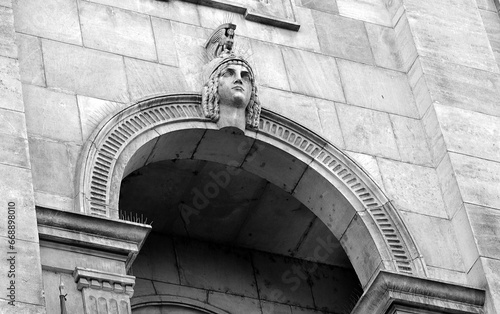 Female head as keystone on arch in Bucharest, Romania