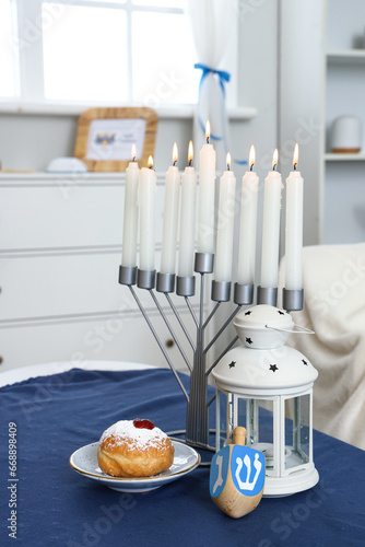 Menorah with doughnut, lant...