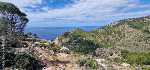 Porto Des Canonge is situated on the North West coast of Mallorca. charming stone beach, it is set against a backdrop nice trail to banyalbulfar with scenic views 