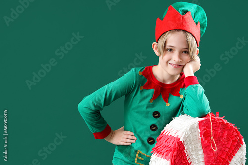 Smiling young boy dressed a...