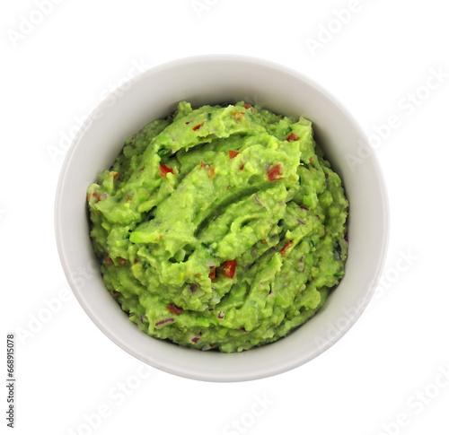 Bowl of delicious guacamole isolated on white, top view