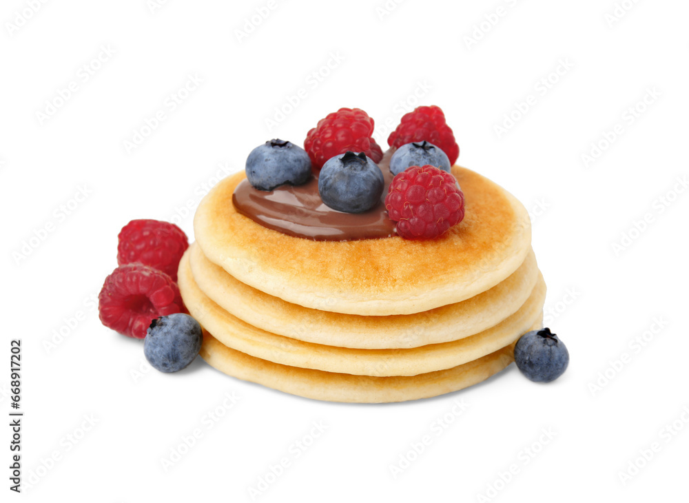 Stack of tasty pancakes with chocolate spread and berries isolated on white Stack of tasty pancakes with chocolate spread and berries isolated on white