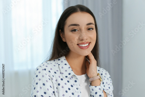 Portrait of beautiful young woman at home Free Download Portrait of beautiful young woman at home - GFXLoad