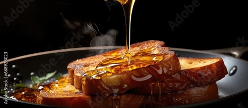 Fried French toast cooked in hot oil photo