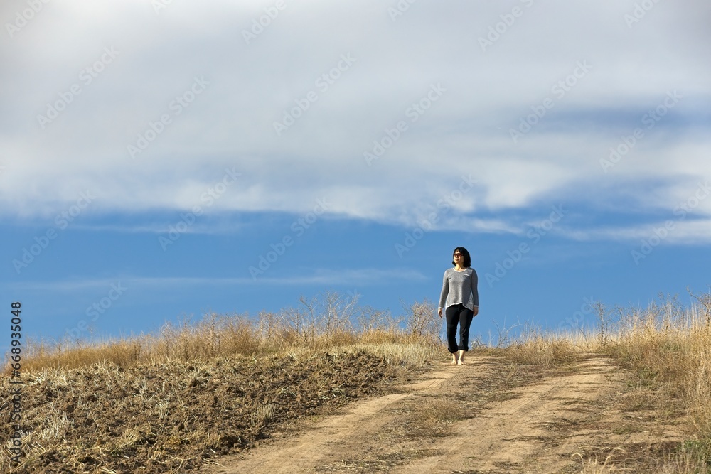 Woman enjoying the day in the country.