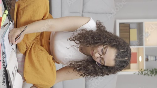 Vertical video of Desperate Female student.