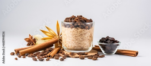 Superfood paleo concept with oats flaxseeds raisins cinnamon anise and chia seeds