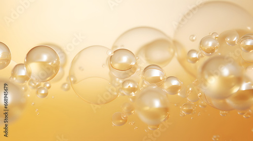 yellow bubbles of oil or serum, bubbling drops of gold liquid,  golden bubbles , golden christmas background © Planetz