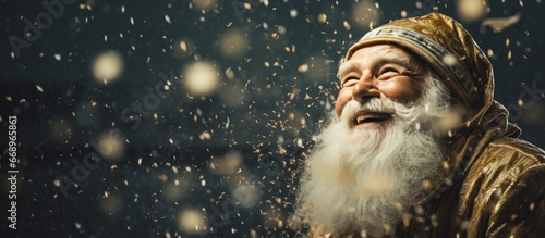 Santa Claus surrounded by a shower of cash during the festive season