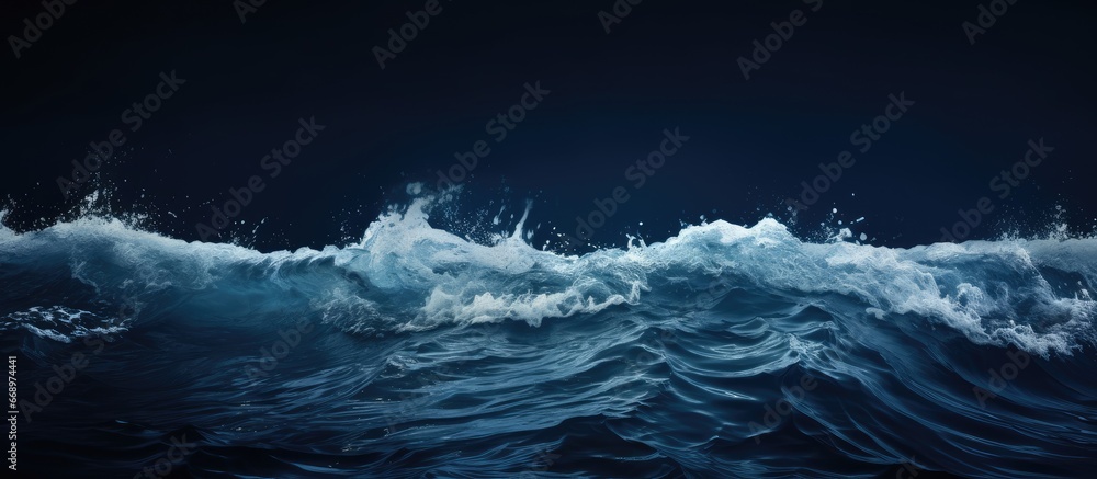 Photograph of the stunning foamy dark sea water surface captured horizontally in color - obrazy, fototapety, plakaty 