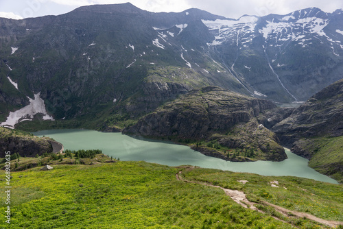 View of the Margaritze Reservoir underneath the Grossglockner Mountain. Austria