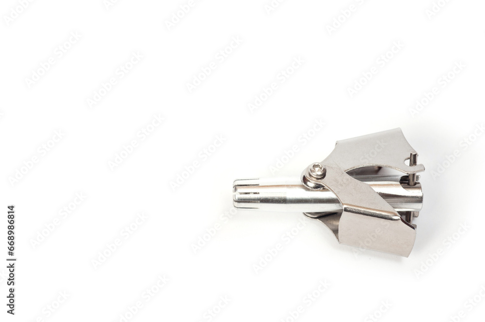 Mechanical trimmer for removing nose hair, made of light metal. Mechanical trimmer for removing nose hair, made of light metal.