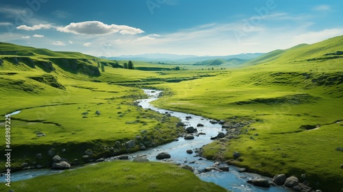 A clear stream winding through a green meadow, the water's path determined by the contours of the land.
