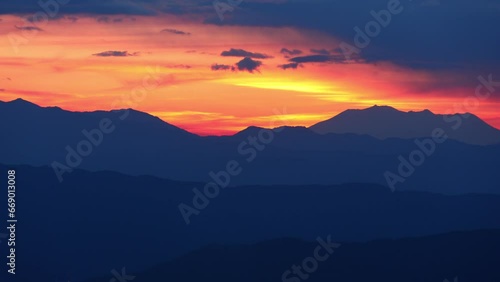 Wallpaper Mural sunset over mountains, time lapse Torontodigital.ca