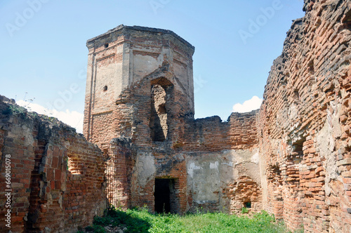 Ruins of the corner tower and walls of the Carthusian monastery of 1648-1666 in the city of Bereza, Belarus. photo