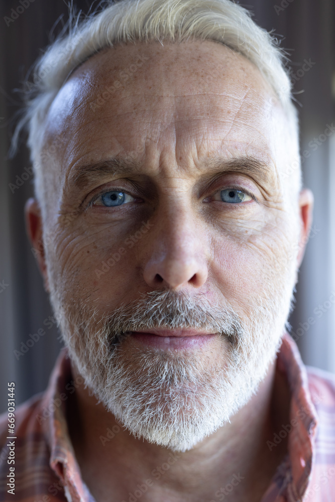 Portrait of happy senior caucasian man smiling at home Portrait of happy senior caucasian man smiling at home