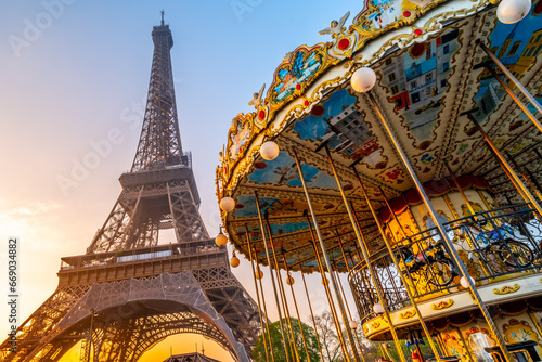 Historical Carousel of the Eiffel Tower. Morning photography at sunrise time. Paris, France
