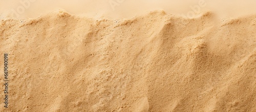 Clear beach sand on a sunny day by the sea