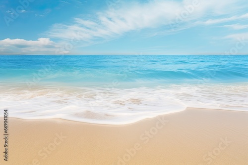 Blue Ocean's Soft Wave Caressing Sandy Beach: A Serene Coastal Moment © Michael