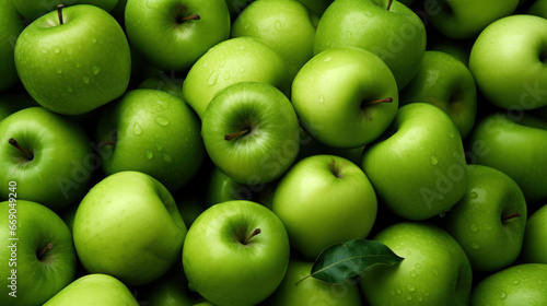 A full-texture of green apples. A background made of fruit.