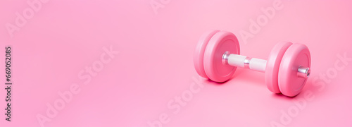 Dumbbell on pink background. Gym, fitness club for women concept. Close-up view. Be active, sporty. Healthy lifestyle. Loss weight and stay motivated. Empty, copy space for text.