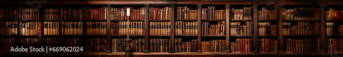 A panoramic and wide banner image capturing the vintage charm of old and tatty leather-bound books snugly nestled within an antique bookcase
