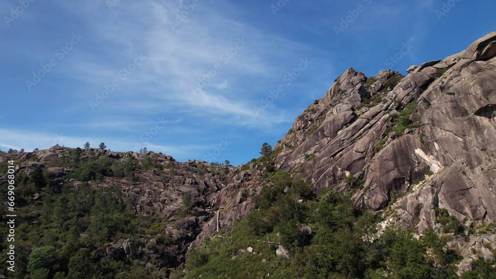 High Mountains with Blue Sky and White Clouds in the Background. Natural Park of Gerês, Portugal