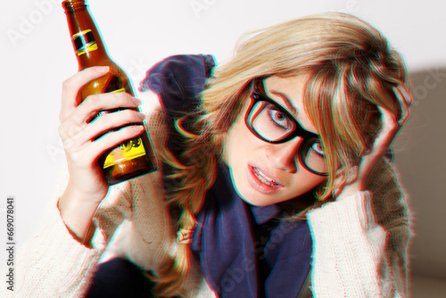 Photography Portrait, fashion and a bottle of beer with a woman in studio isolated on a white background feeling dizzy closeup