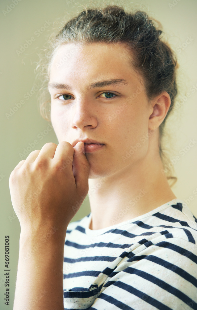 Portrait, man and thinking in studio for fashion, clothes or style in London. Young person, male model and serious look on face, hand and mouth for hairstyle, cool or trendy on background in space Portrait, man and thinking in studio for fashion, clothes or style in London. Young person, male model and serious look on face, hand and mouth for hairstyle, cool or trendy on background in space