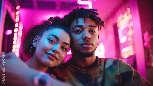 Cheerful modern beautiful young teenage couple hugging standing outdoor, taking a selfie. African American guy and Caucasian girl generation z. technology and youth concept. party at night. ai